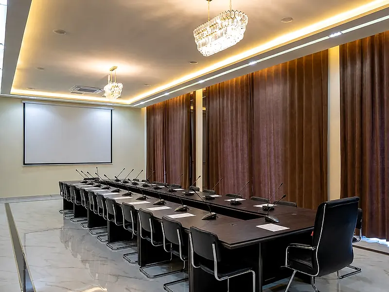 A sanatorium conference hall laid out for a meeting