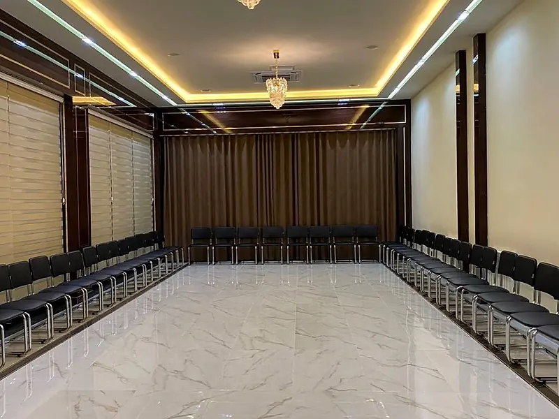 A conference hall laid out for a meeting
